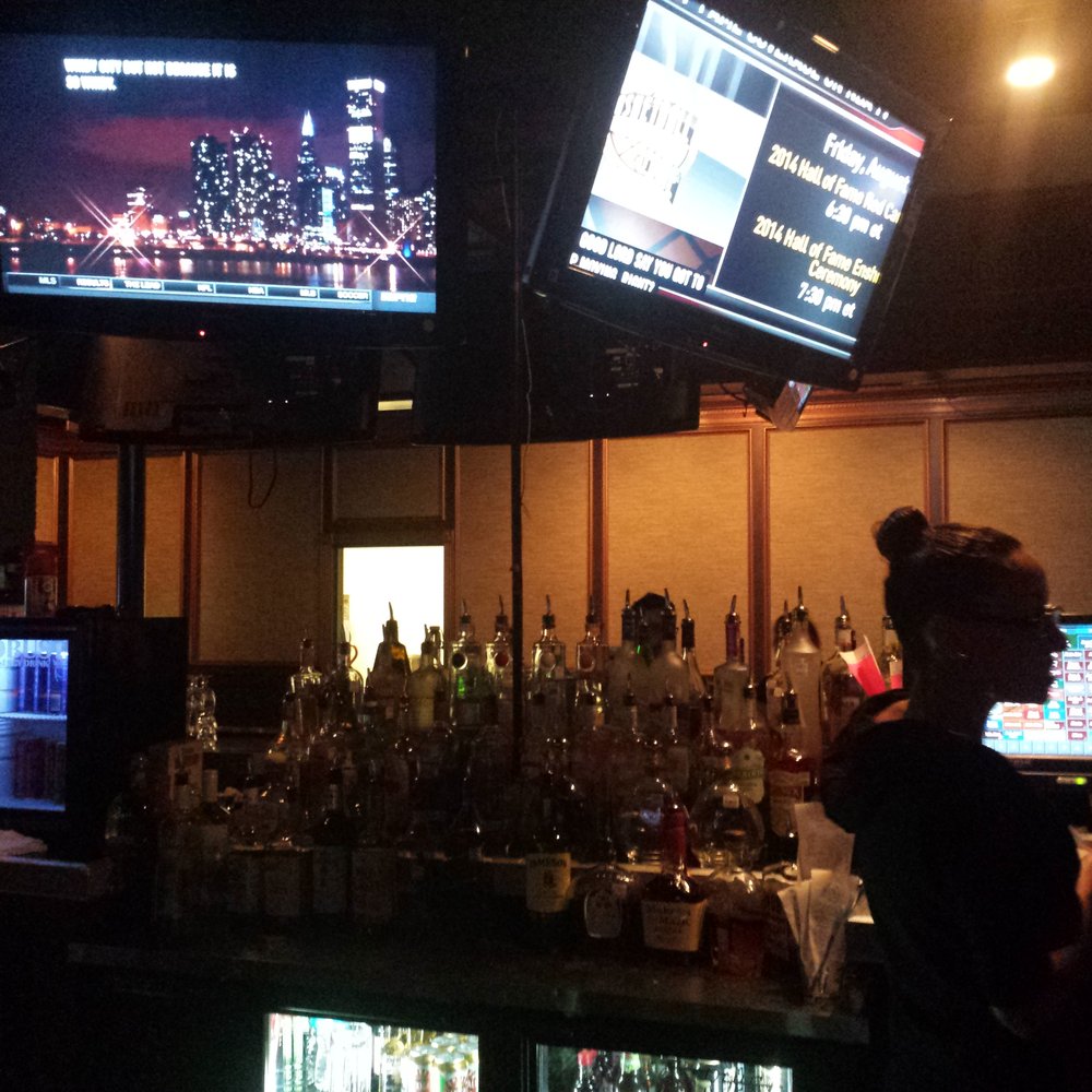 Eddy's Tavern & Social San Antonio - Perrin Beitel - a bar with a large screen tv - Sports Bars Near Me - San Antonio, Texas Eddy's Tavern & Social San Antonio - Perrin Beitel - a bar with a large screen tv - Sports Bars Near Me - San Antonio, Texas