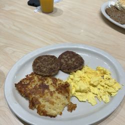 The Toasted Yolk Cafe- Fulshear - Eggs, cheesy hash browns, sausage
