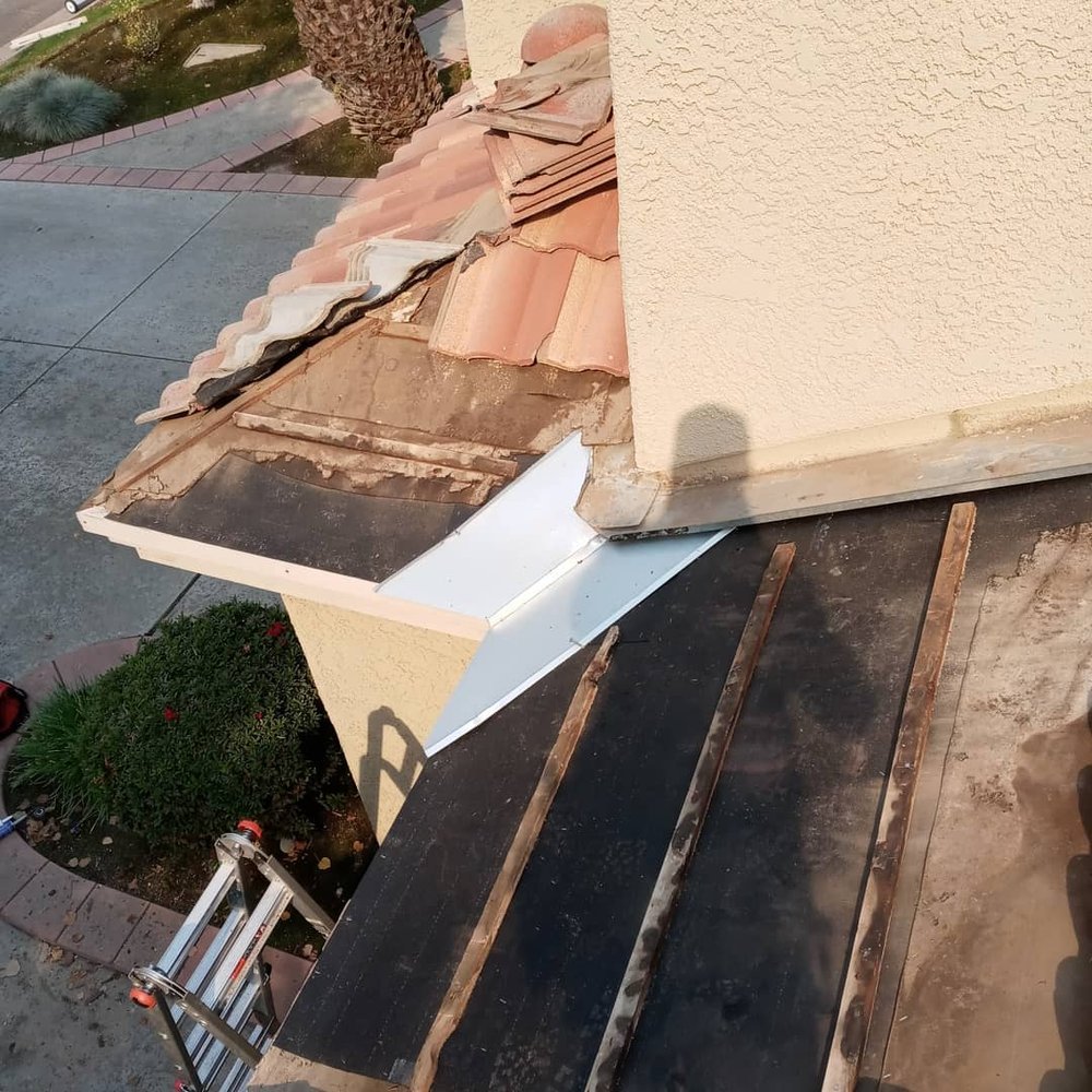 Slide of Pristine Roofing