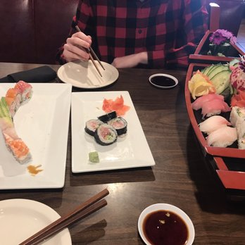 Sushi House - Rainbow roll (somewhat eaten), yellowtail traditional roll (half eaten), and a fresh supreme boat. - Sushi Bars Near Me - Spokane Valley, Washington Sushi House - Rainbow roll (somewhat eaten), yellowtail traditional roll (half eaten), and a fresh supreme boat. - Sushi Bars Near Me - Spokane Valley, Washington