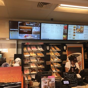 Dunkin' - a woman behind a counter in a donut shop - Coffee & Tea Near Me - Peekskill, New York Dunkin' - a woman behind a counter in a donut shop - Coffee & Tea Near Me - Peekskill, New York