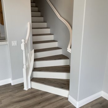 RSM Floors - Vinyl plank staircase with white riser - Flooring Near Me RSM Floors - Vinyl plank staircase with white riser - Flooring Near Me