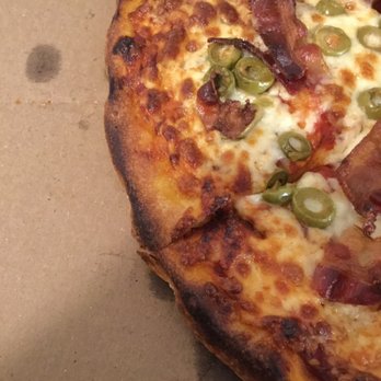 Gabriel Pizza - Black crust on an expensive large pizza. - Pizza Near Me Gabriel Pizza - Black crust on an expensive large pizza. - Pizza Near Me