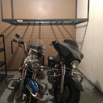 Stellar Garage Storage - two motorcycles parked in a garage - General Contractors Near Me Stellar Garage Storage - two motorcycles parked in a garage - General Contractors Near Me