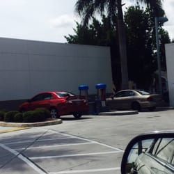 Chevron Stations - One of the many reasons I hate MIAMI. Two cars parked in the air & water space, none of them getting air or water.