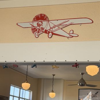 Flight Line Café - Check out the mini planes hanging from the ceiling, and the art deco light fixtures! - Breakfast & Brunch Near Me - Fresno, California Flight Line Café - Check out the mini planes hanging from the ceiling, and the art deco light fixtures! - Breakfast & Brunch Near Me - Fresno, California