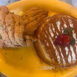 Originally pancake with caramel drizzle on top and fried fish Originally pancake with caramel drizzle on top and fried fish