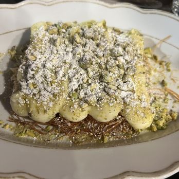 Cava Mezze - Olney - Ekmek - a Greek dessert with three layers of crispy pastry, orange cream, and pistachios - Mediterranean Near Me - Olney, Maryland