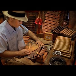 Smokies Tobacco Shop - Cigar Roller.