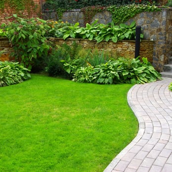 CAT Services, LLC - a brick pathway in a garden - Landscaping Near Me CAT Services, LLC - a brick pathway in a garden - Landscaping Near Me