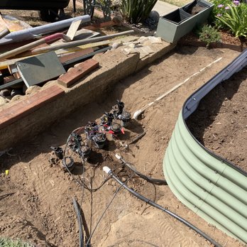 Duran Landscape & Design - 6 valve drip system located in area of easy access and out of sight - Landscaping Near Me Duran Landscape & Design - 6 valve drip system located in area of easy access and out of sight - Landscaping Near Me