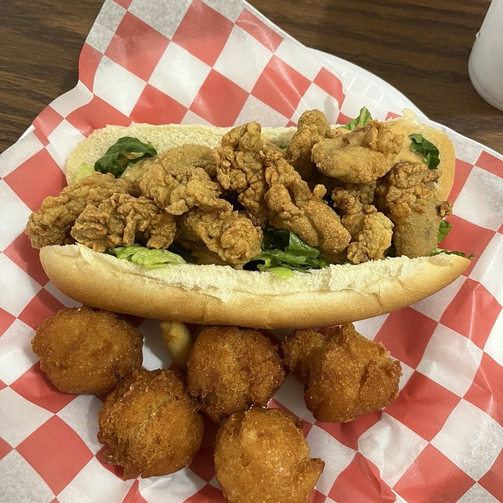 Graham & Rollins - Oyster poboy and Hush Puppies - Seafood Near Me - Hampton, Virginia Graham & Rollins - Oyster poboy and Hush Puppies - Seafood Near Me - Hampton, Virginia