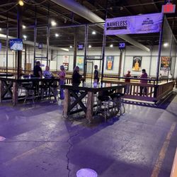 The Fowling Warehouse Indianapolis - Tables for viewing and the fowling pit.
