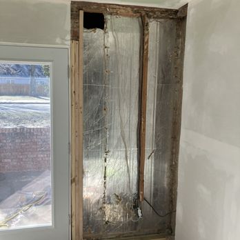 Stand On It Construction - We discover there is no insulation in this outer wall. Missing a stud, see the line on the aluminum. Damaged stud just left as is. - General Contractors Near Me Stand On It Construction - We discover there is no insulation in this outer wall. Missing a stud, see the line on the aluminum. Damaged stud just left as is. - General Contractors Near Me
