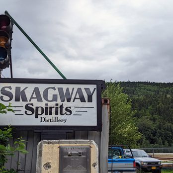 Skagway Spirits Distillery - Love the stoplight above the old sign - Distilleries Near Me - Skagway, Alaska Skagway Spirits Distillery - Love the stoplight above the old sign - Distilleries Near Me - Skagway, Alaska