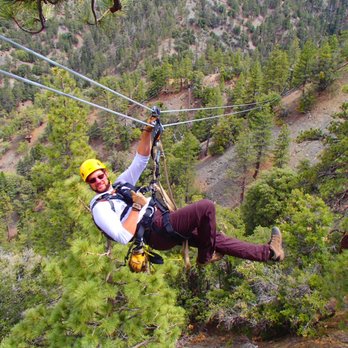 Ziplines at Pacific Crest - One of our tour guides Nick showing us how to have fun - Ziplining Near Me - Wrightwood, California Ziplines at Pacific Crest - One of our tour guides Nick showing us how to have fun - Ziplining Near Me - Wrightwood, California