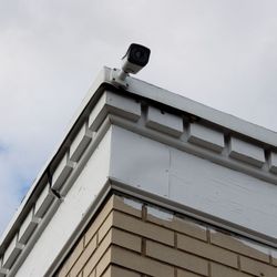 Get Connected Solutions - 4MP Outdoor Bullet camera overlooking parking lot with built in intelligence.