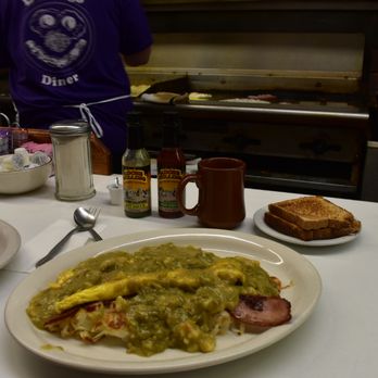 Durango Diner - "The Cure" with bacon. Eggs and hash browns smothered in green sauce. Probably cheese somewhere in there too. - Diners Near Me - Durango, Colorado