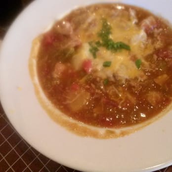 Poco & Moms - Green Chile pork stew, delicious comfort food. Comes with a tortilla as well. - American Near Me - Tucson, Arizona