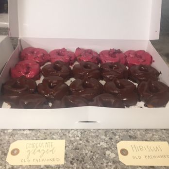 Good Dough - Some donuts for our office gathering - hibiscus and chocolate old fashioned with cute labels too! - Donuts Near Me - Jacksonville, Florida Good Dough - Some donuts for our office gathering - hibiscus and chocolate old fashioned with cute labels too! - Donuts Near Me - Jacksonville, Florida