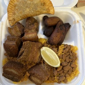 La Palma - Chicharron yellow rice and beans plantains and a beef Empanada with cheese - Dominican Near Me - Greensboro, North Carolina La Palma - Chicharron yellow rice and beans plantains and a beef Empanada with cheese - Dominican Near Me - Greensboro, North Carolina