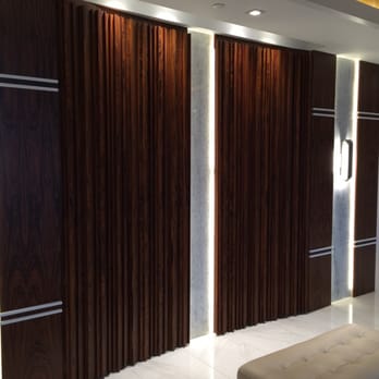 Berlin Designs Corporate Division - Gorgeous millwork installation at Alhambra Condominium Lobby - Interior Design Near Me