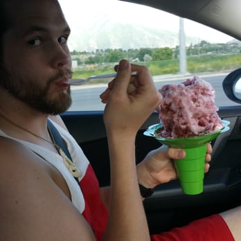 Lani's Shaved Ice - a man in a car eating an ice cream cone - Shaved Ice Near Me - Spanish Fork, Utah Lani's Shaved Ice - a man in a car eating an ice cream cone - Shaved Ice Near Me - Spanish Fork, Utah