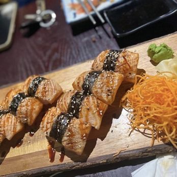 Uchi - a wooden board with sushi on it - Japanese Near Me - Montreal, Quebec Uchi - a wooden board with sushi on it - Japanese Near Me - Montreal, Quebec
