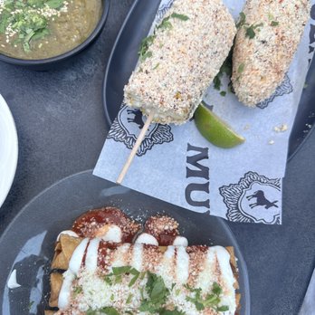 Mula Mexican Kitchen & Tequileria - Elotes and chicken rolled tacos - Bars Near Me - Omaha, Nebraska Mula Mexican Kitchen & Tequileria - Elotes and chicken rolled tacos - Bars Near Me - Omaha, Nebraska