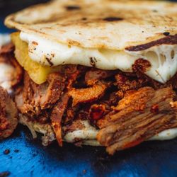La Casa De Los Tacos Al Pastor - Mulita 

Mexican sandwich