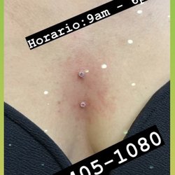 Freedom Skin Tattoo - Surface piercing.