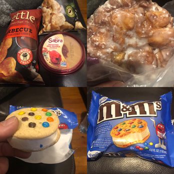 7-Eleven - a person holding a cookie and a bag of m & m's - Convenience Stores Near Me - Forest Hills, New York
