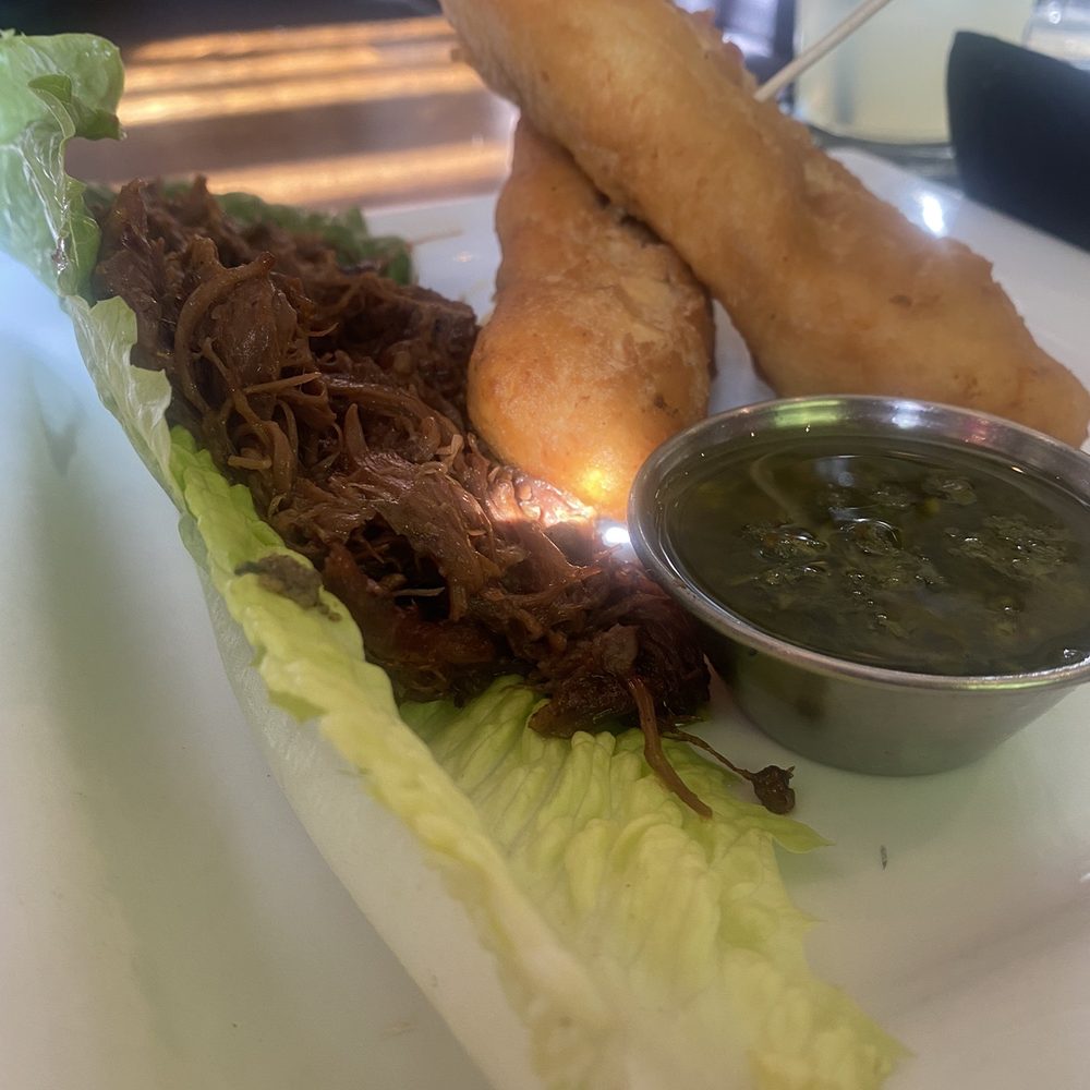 Negril ATL - Oxtail Wrap w/ Jamaican Festival - Caribbean Near Me - Atlanta, Georgia Negril ATL - Oxtail Wrap w/ Jamaican Festival - Caribbean Near Me - Atlanta, Georgia