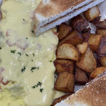 La Croisette - Amazing omelette! The Hangover. Hash, tomatoes and the most delicious and rich hollandaise! - Breakfast & Brunch Near Me - St. Pete Beach, Florida La Croisette - Amazing omelette! The Hangover. Hash, tomatoes and the most delicious and rich hollandaise! - Breakfast & Brunch Near Me - St. Pete Beach, Florida