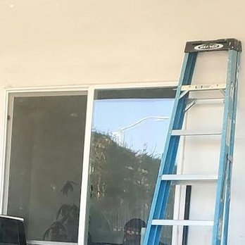 M's Body Shop - The worker inside the office with the phone - Body Shops Near Me - Santa Monica, California M's Body Shop - The worker inside the office with the phone - Body Shops Near Me - Santa Monica, California