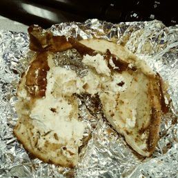 Rock hard toasted everything bagel with a smear of cream cheese and two skinny strips of bacon. Rock hard toasted everything bagel with a smear of cream cheese and two skinny strips of bacon.