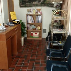 The Hair Connection - Clean waiting area with lots of hair style books. Plus, toys and book for the kiddos to enjoy.