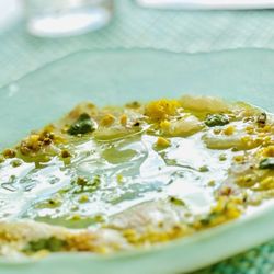 NOMA Beach at Redfish - SNAPPER CRUDO
Toasted pistachios, petit mint, lemon zest, & EVOO