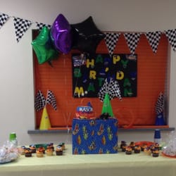 Dottie's Cupcakery - Hot wheels cake with track, cupcakes, cookie favors for our son's Hot Whees birthday.