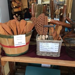 a basket of wooden utensils