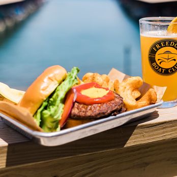 Marina Station - a burger and fries on a tray with a glass of beer - Bars Near Me - Hiawassee, Georgia Marina Station - a burger and fries on a tray with a glass of beer - Bars Near Me - Hiawassee, Georgia