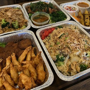 Thai Basil - four trays of food on a table - Thai Near Me - Chantilly, Virginia Thai Basil - four trays of food on a table - Thai Near Me - Chantilly, Virginia