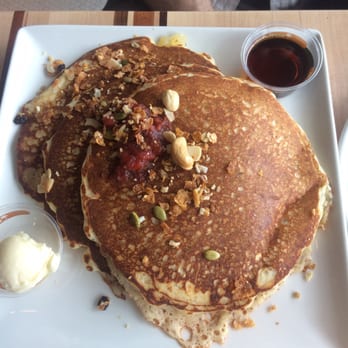 Root Down DIA - Almond pancakes with strawberry rhubarb jam and nuts - New American Near Me - Denver, Colorado Root Down DIA - Almond pancakes with strawberry rhubarb jam and nuts - New American Near Me - Denver, Colorado