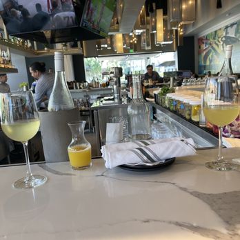 The Goldfinch - Mimosa Kit with Brut Champagne and Pineapple Juice. - New American Near Me - Irvine, California The Goldfinch - Mimosa Kit with Brut Champagne and Pineapple Juice. - New American Near Me - Irvine, California
