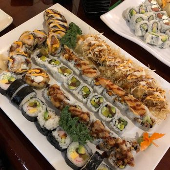 Sushi Bon - The mango Chicago (top row with the potato crunch on it) was my most favorite one. It was tasty, delicious, and crab in it! - Sushi Bars Near Me - Warren, Michigan Sushi Bon - The mango Chicago (top row with the potato crunch on it) was my most favorite one. It was tasty, delicious, and crab in it! - Sushi Bars Near Me - Warren, Michigan