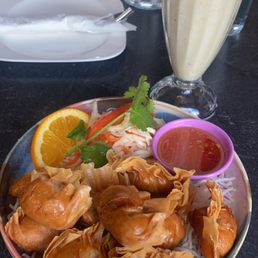 Shrimp pad Thai, spicy beef with house salad, shrimp fried dumplings and a banana shake Shrimp pad Thai, spicy beef with house salad, shrimp fried dumplings and a banana shake