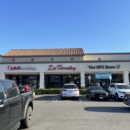 The front of Zia Threading in the shopping center.. The front of Zia Threading in the shopping center..