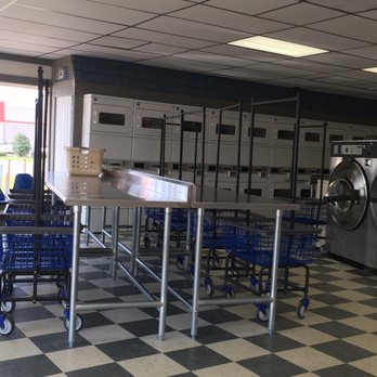Mr Clean Washateria - Lots of clean folding tables and a herd of carts to the customers. - Laundry Services Near Me - Humble, Texas Mr Clean Washateria - Lots of clean folding tables and a herd of carts to the customers. - Laundry Services Near Me - Humble, Texas