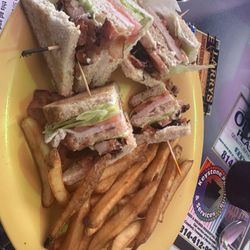 Missy's Arcade Restaurant - Club sandwich with bacon and turkey. Hand cut fries. Looked over cooked but not!
