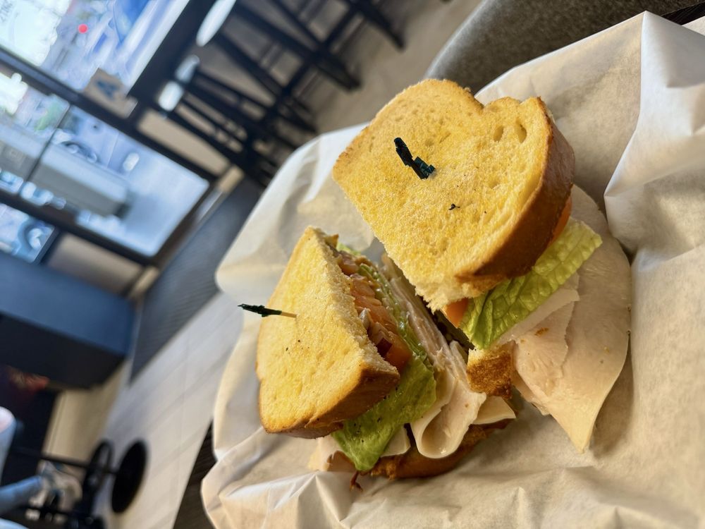 Pure Fruit Bar & Deli Logo